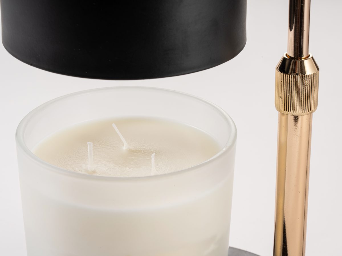 Shade set at the right height above a large three-wick candle