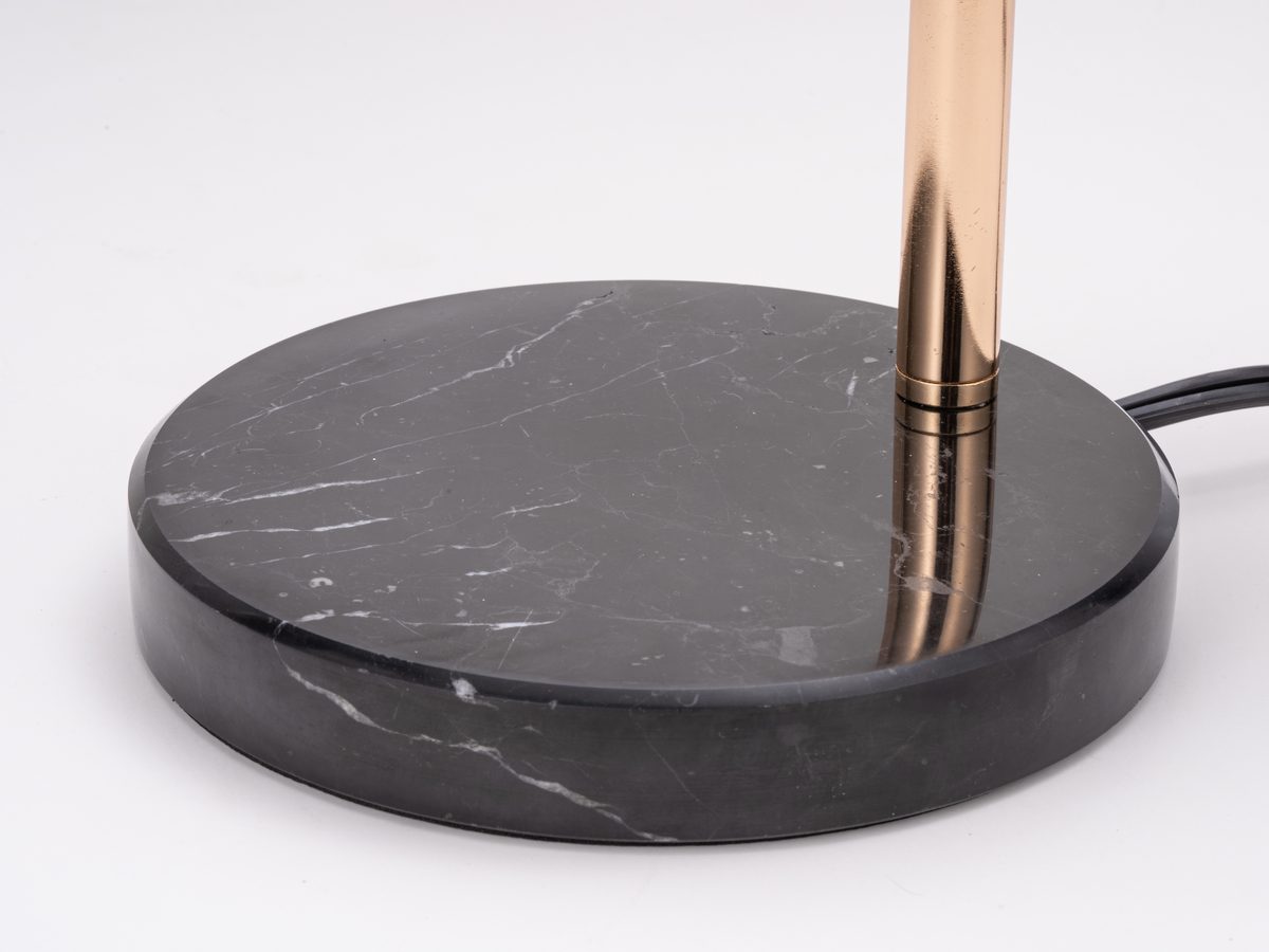 Genuine marble base with natural veining